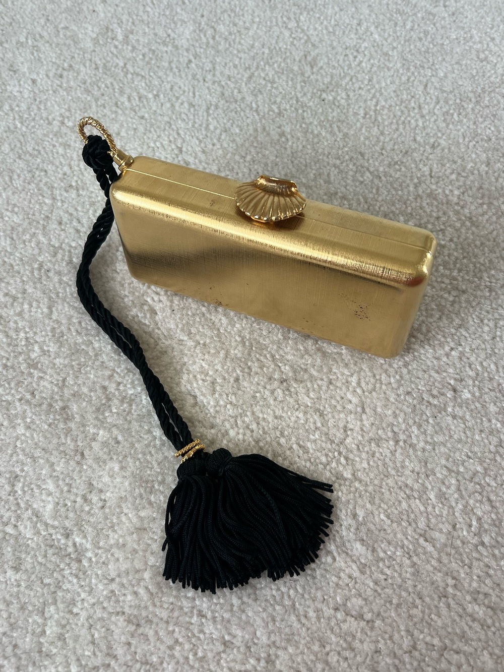 Gold Shell-Top Evening Clutch with Black Tassel Wristlet
